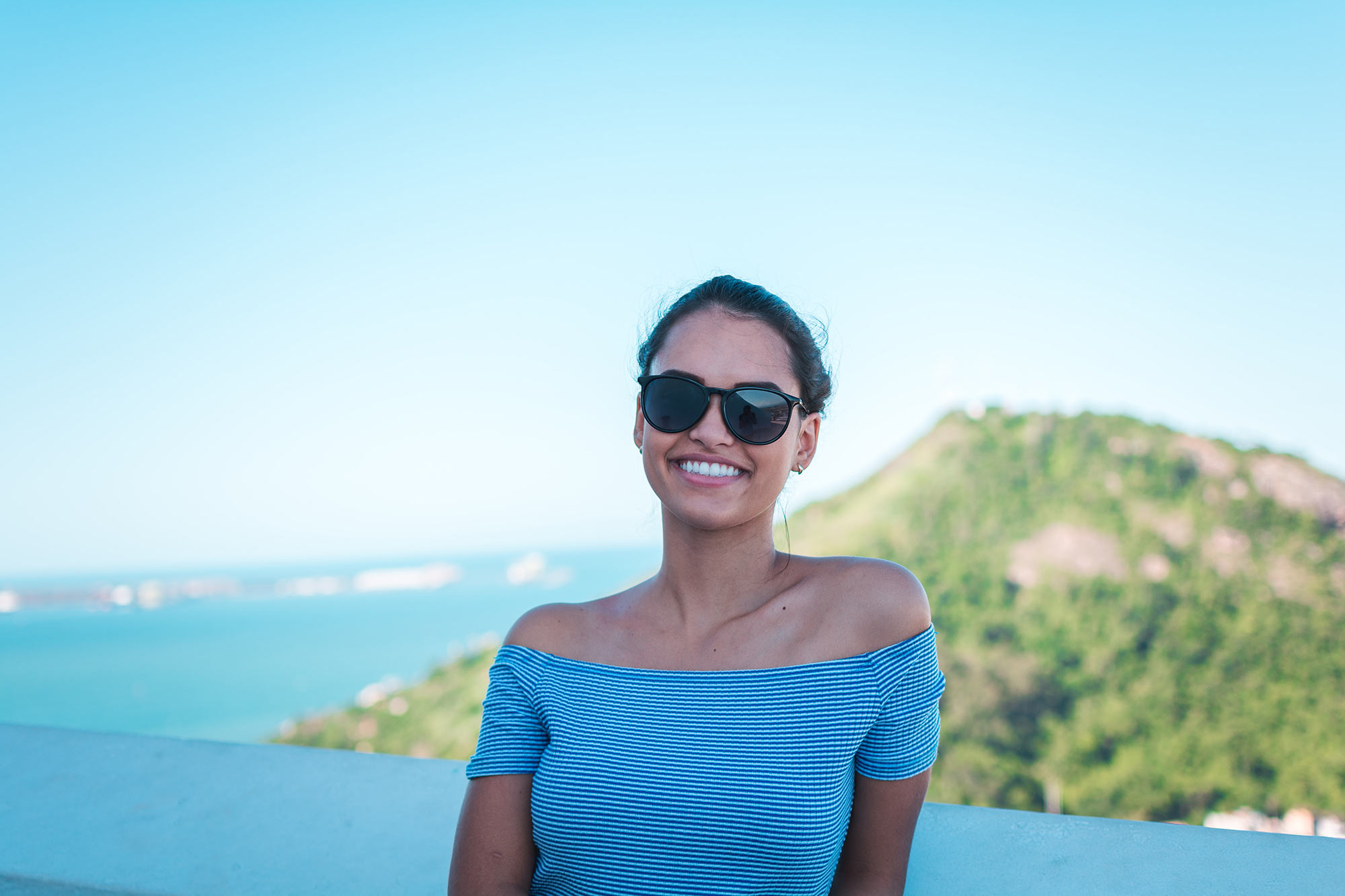 Woman wearing Sea Flite sunglasses near the ocean